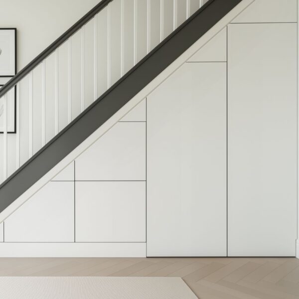 Bespoke under stairs storage with three drawers and two cupboards – minimalist fitted furniture by Pro Spaces