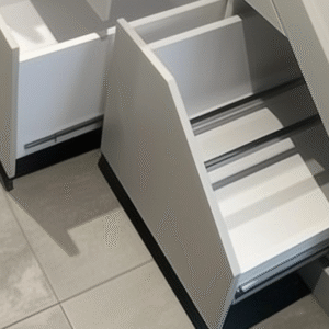 Pull-out under stairs shoe storage drawer with built-in rails – bespoke hallway solution by Pro Spaces